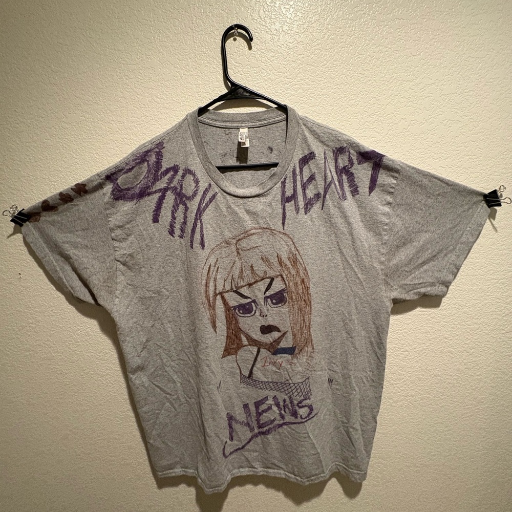 1/1 Dark Heart News Prototype T-Shirt by “Livxy, A PissNapkin Production”.